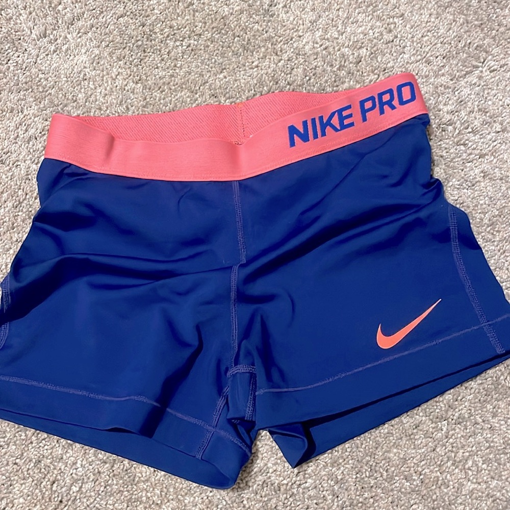 Nike Pro Blue Dri-Fit Spandex with coral pink band and logo